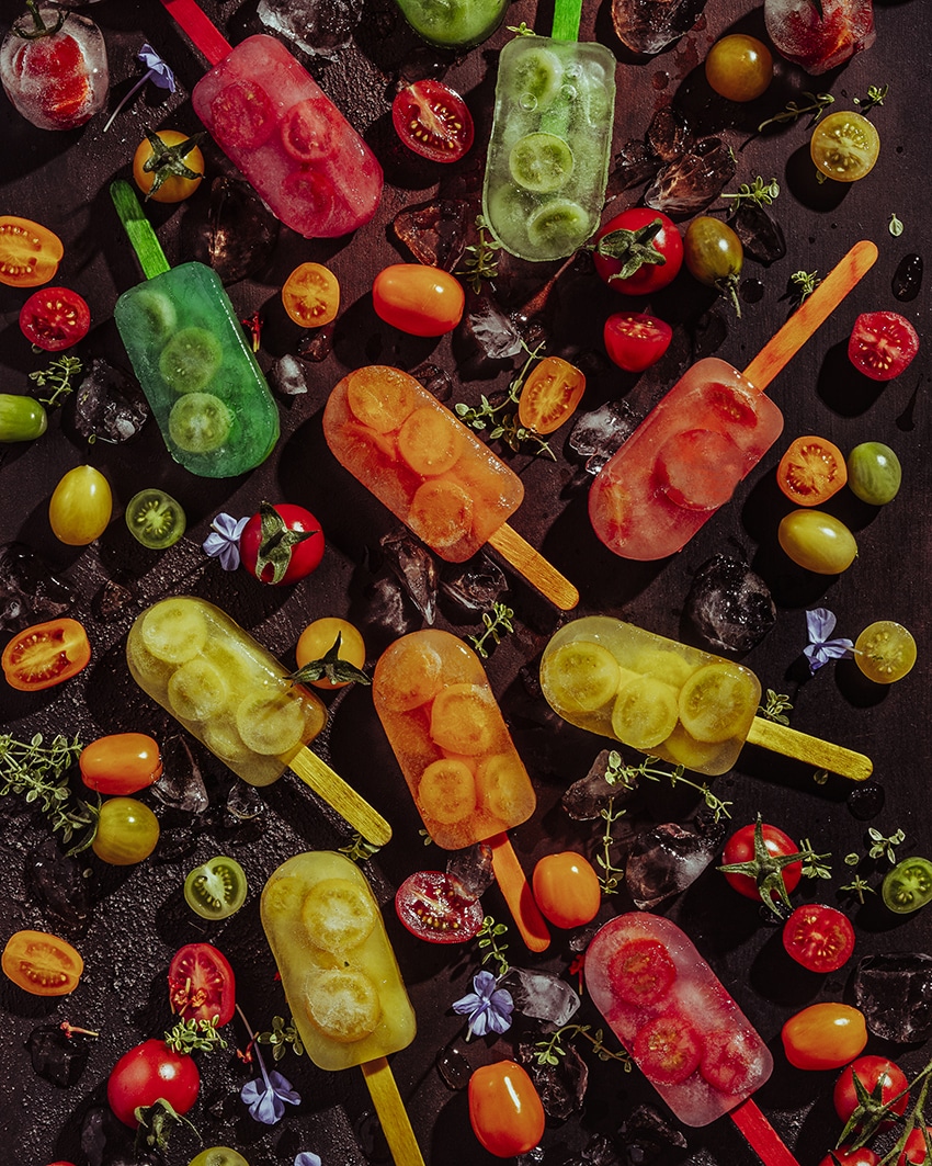 colorful Ice cream Tomatoes, some sliced, shot from above